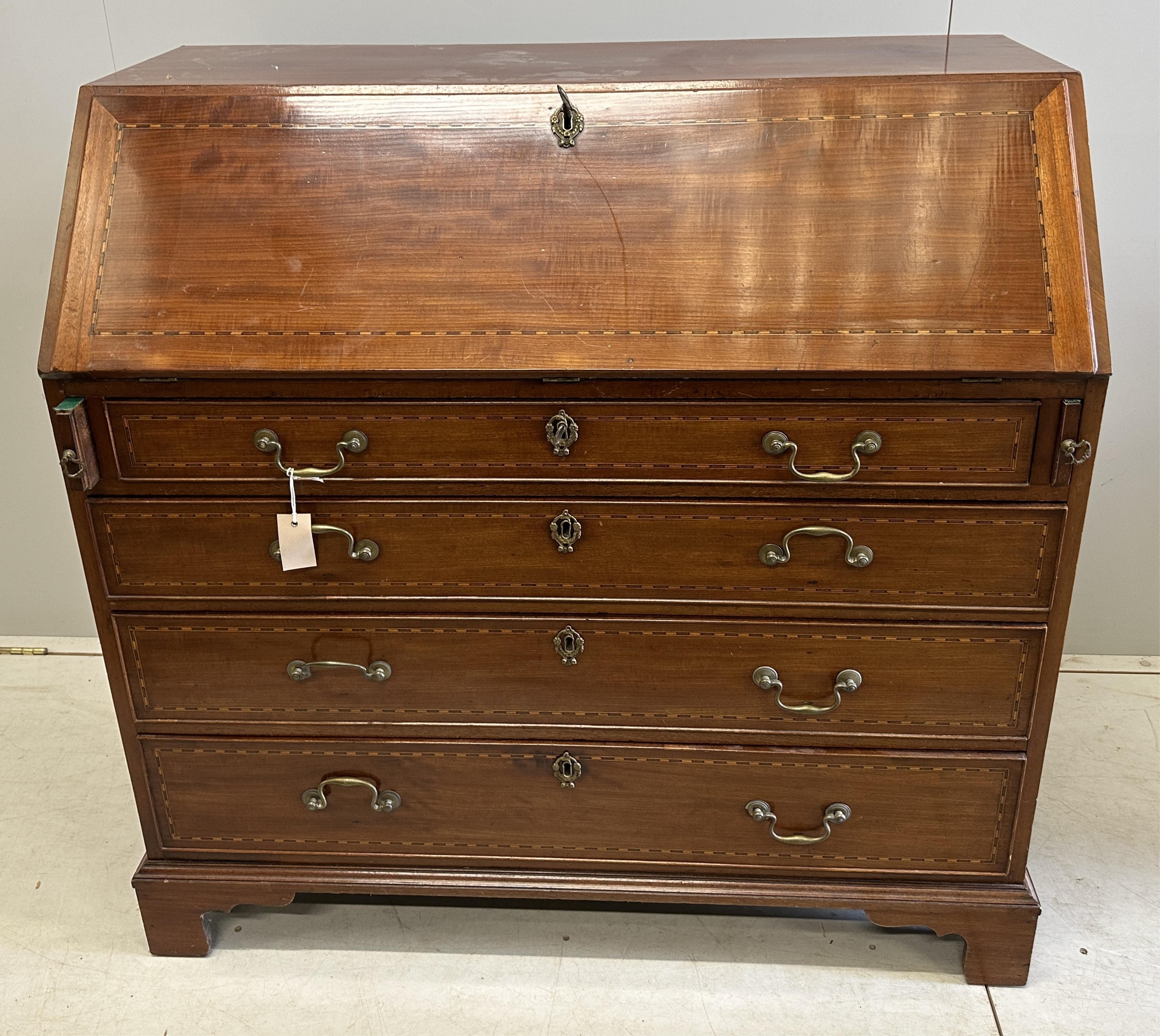A George III mahogany bureau, width 108cm, depth 54cm, height 107cm. Condition - good, interior fair